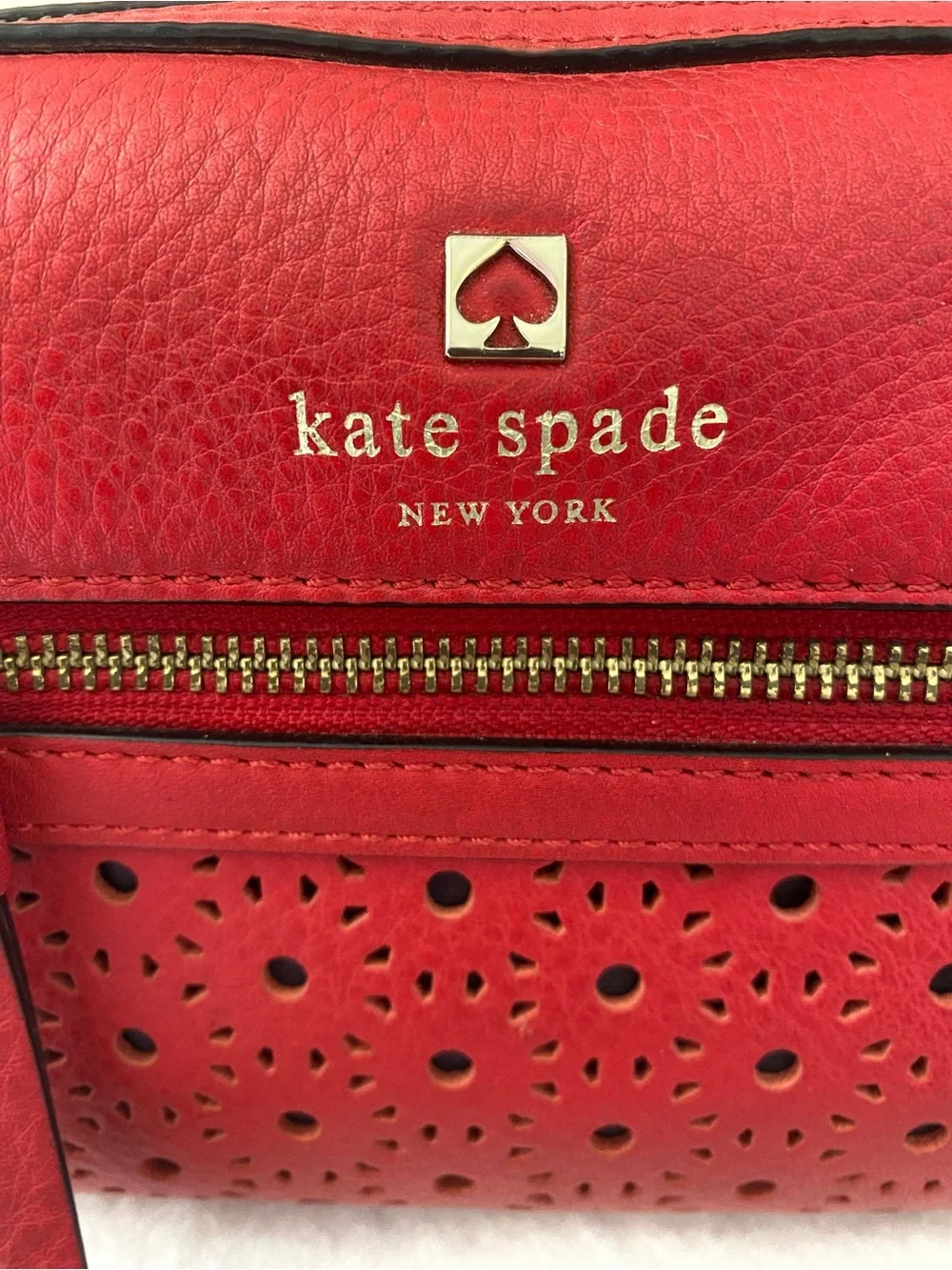 kate spade Perri Lane Bubbles Looloo red laser-cut crossbody